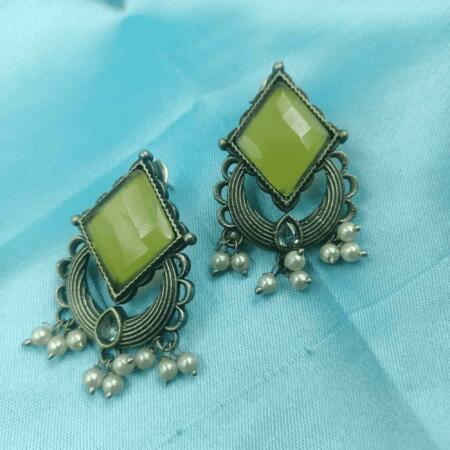 Ethereal Glow Silver Oxidized Yellow Color Dangler Earrings
