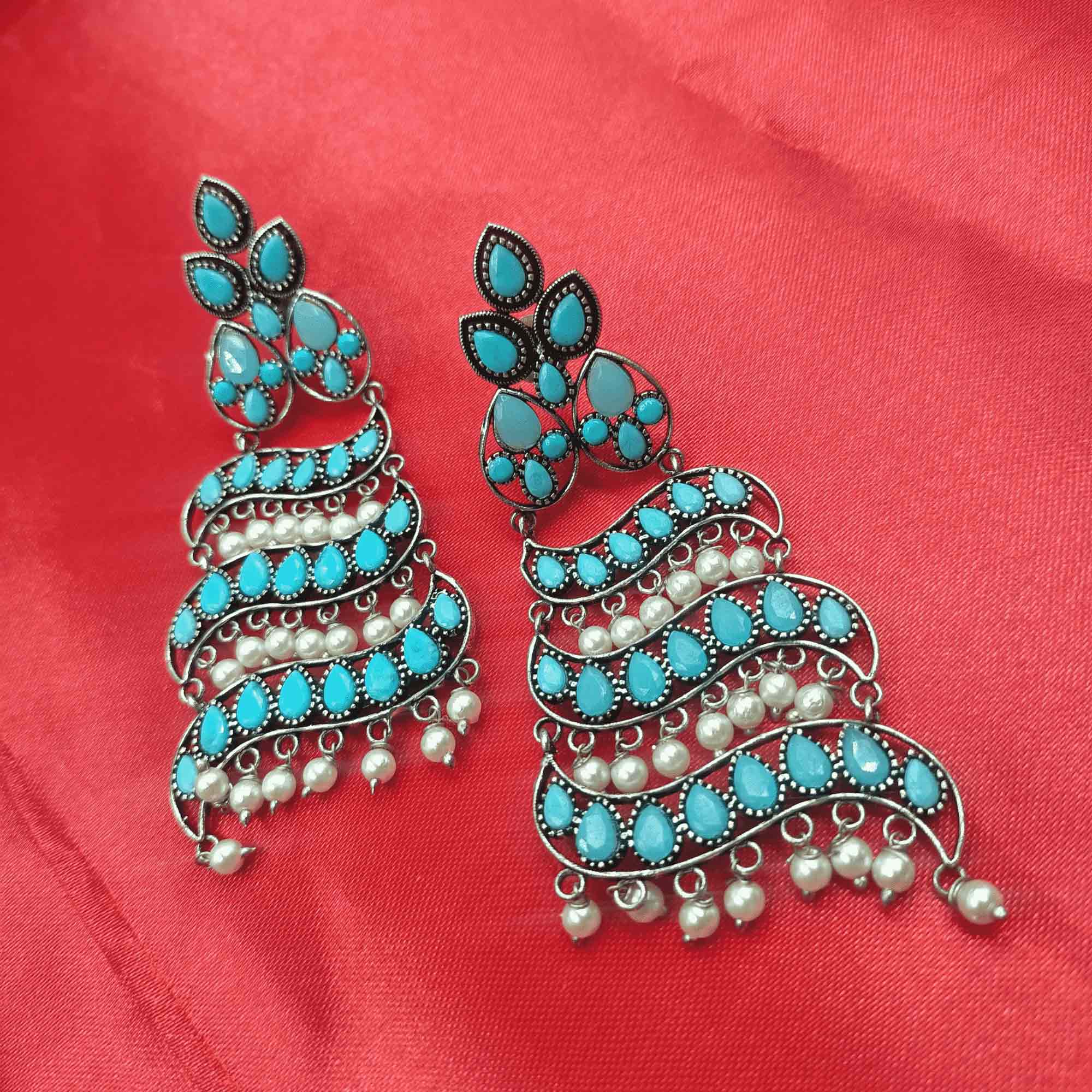 Ethereal Glow Silver Oxidized turquoise Blue Color Dangler Earrings